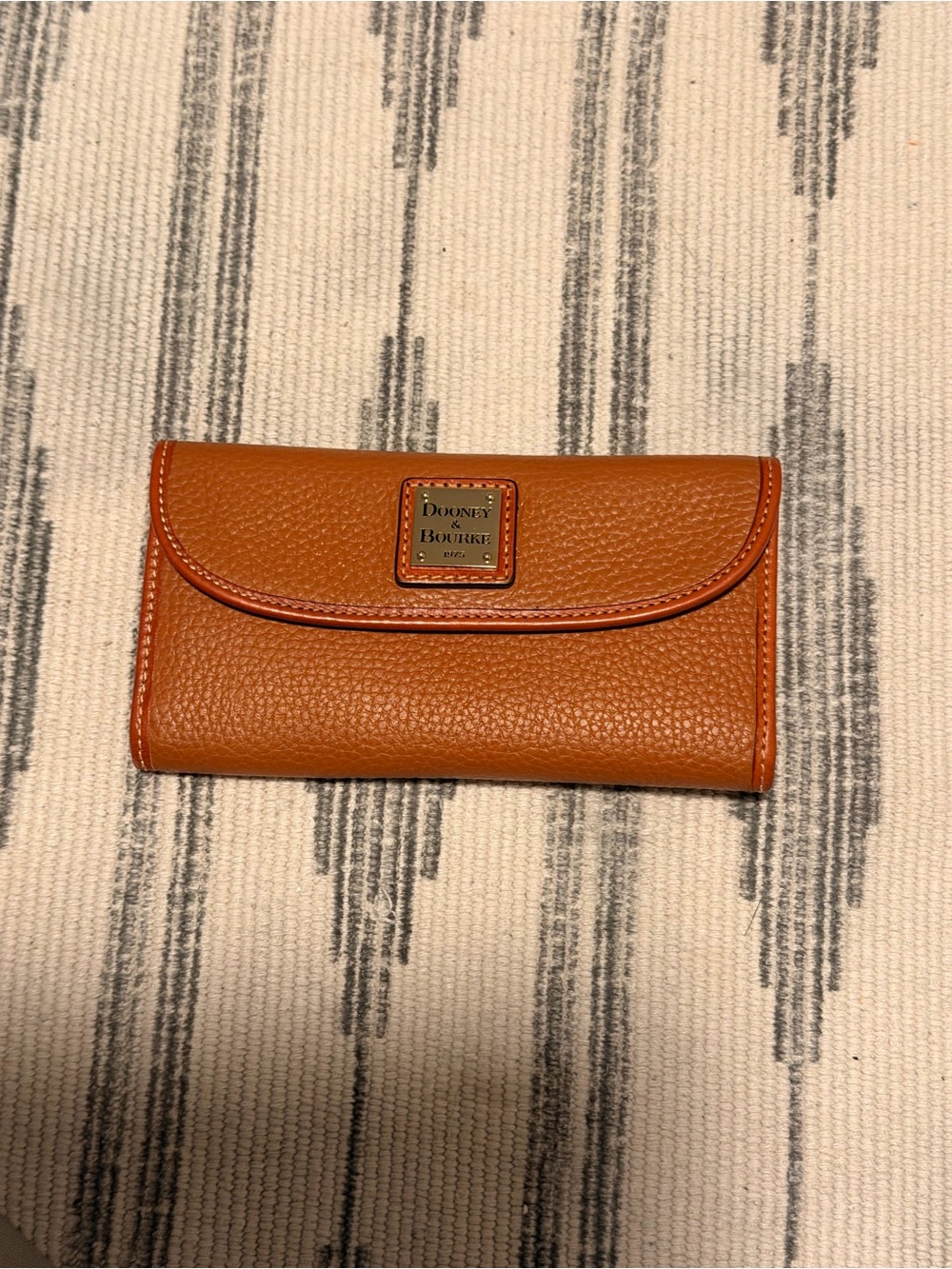 Dooney & Bourke Pebbled Leather Continental Wallet in Cognac